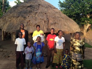 Tanas with his family at home.
